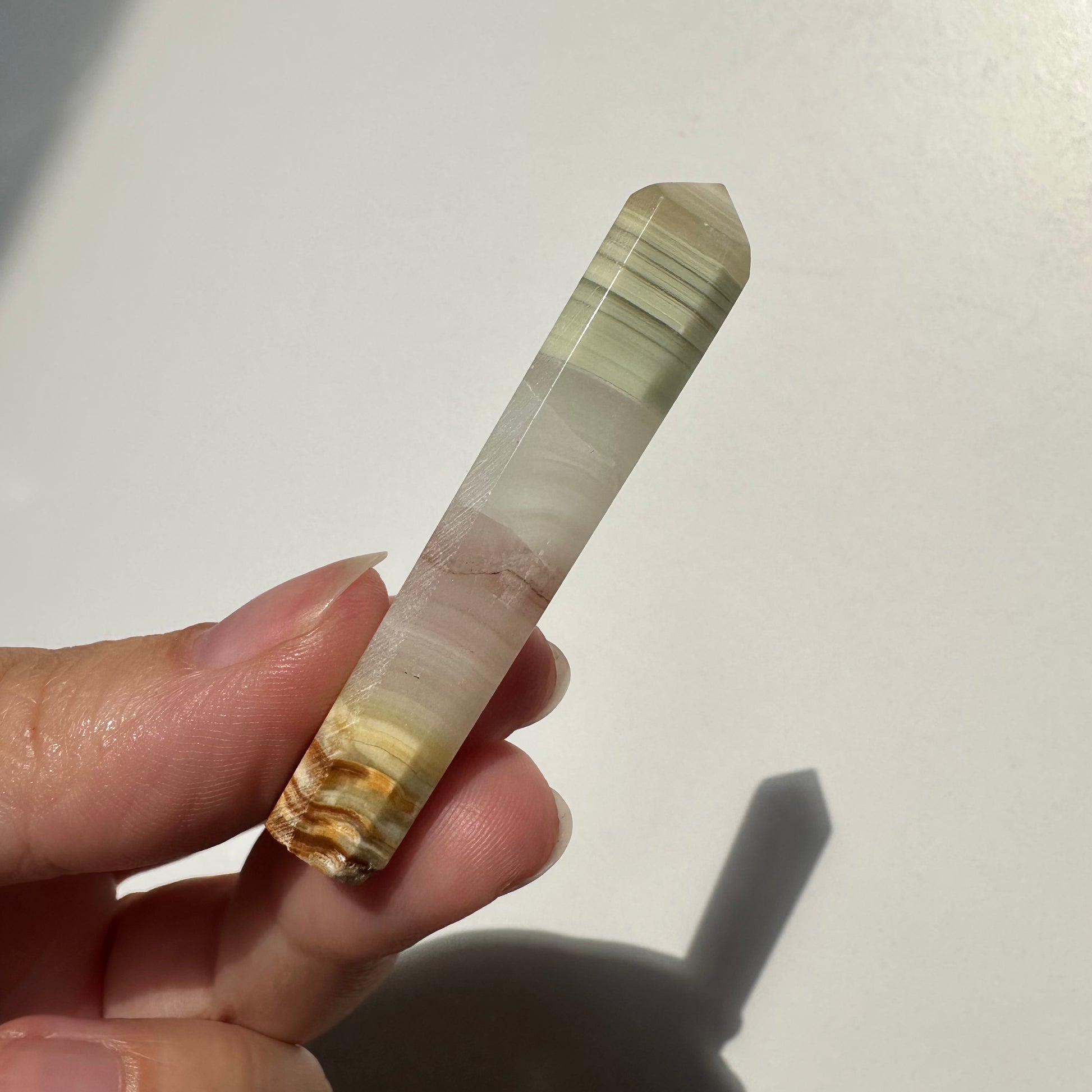 Onyx Spitze mit rosafarbenem Band